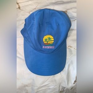 Light blue baseball cap.